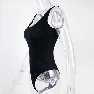 Side view of black ribbed sleeveless bodysuit on mannequin showing high-cut leg and slim fit