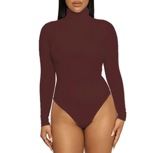 Detail of dark brown turtleneck long sleeve bodysuit with slim fit and soft fabric texture