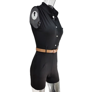 Close-up of black sleeveless romper with buttoned collar and brown leather belt detail