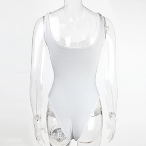 Detail view of white rib-knit bodysuit featuring a deep U-back design and textured fabric