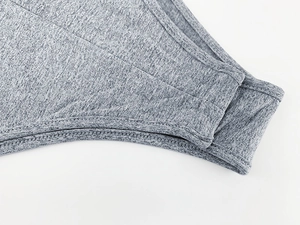Close-up of heather grey bodysuit leg edge with durable double-needle stitching detail