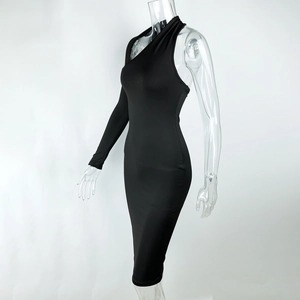Detail of a slim fit black dress featuring an asymmetric halter neck and sleeveless cut