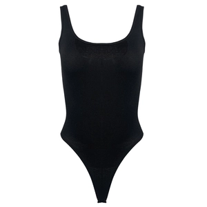 Close-up of black ribbed knit bodysuit showing high-quality vertical texture and square neck