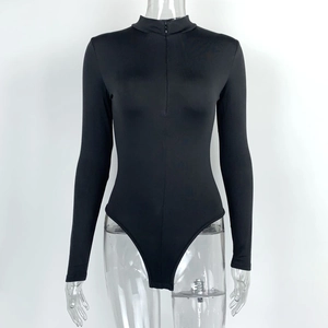 Detail of black long sleeve bodysuit featuring a front zipper and mock neck collar