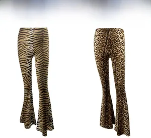 Detail showing high-waisted leopard and tiger print flare pants with slim fit silhouette