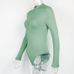 Detail view of mint green long sleeve bodysuit with stand collar and front zipper closure