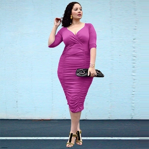 Detail of ruched waist and deep V-neckline on a purple plus size bodycon dress