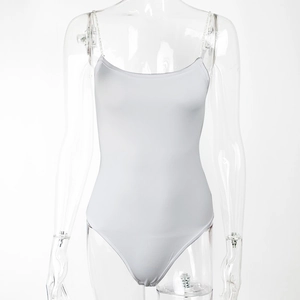 Detail view of white slim fit bodysuit with delicate diamond chain shoulder straps