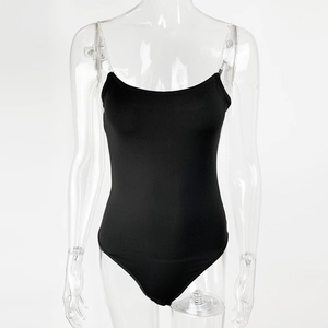 Detail of black slim fit bodysuit featuring sparkly silver rhinestone chain straps