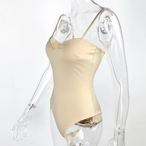 Side view of beige V-neck strapless bodysuit on mannequin with fine knit texture