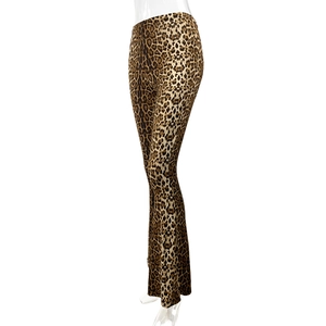 Detail shot of leopard print flare pants showing high waist cut and stretchy fabric
