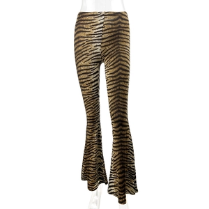 Detail of high waist leopard print flare pants with trendy animal pattern and slim fit design