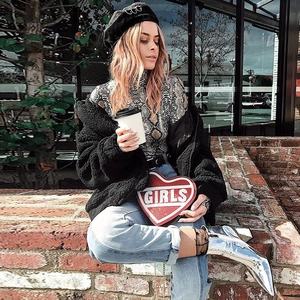 Chic street style featuring snake print turtleneck bodysuit and red heart-shaped shoulder bag