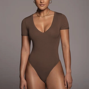 Detailed view of dark brown V-neck bodysuit with short sleeves and seamless elastic fabric