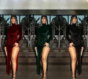 Close-up of three elegant velvet dresses with high necks and pleated slit details