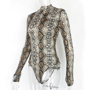 Detail of snake print bodysuit with thumbhole sleeves and high collar neck design