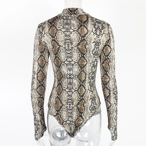 Close-up of the back view showing snakeskin print texture and high collar on the bodysuit