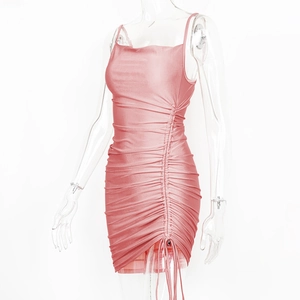 Detail of pink satin mini dress featuring side drawstring ruching and thin straps
