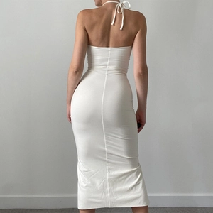 Elegant white backless midi dress with ruched slit and halter neck tie closure