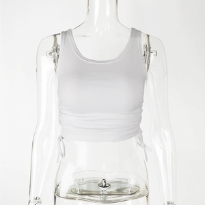 Detail of white ribbed crop top with adjustable side drawstrings and ruching effect