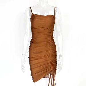 Detailed view of caramel drawstring mini dress with ruching and adjustable side ties