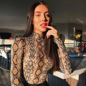 Sexy snake print long sleeve turtleneck bodysuit with a slim fit silhouette for women