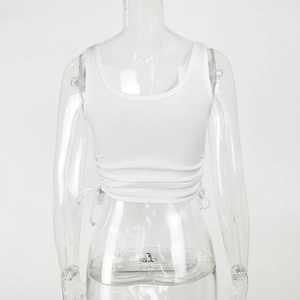 Detailed back view of white ribbed crop top featuring adjustable side drawstrings