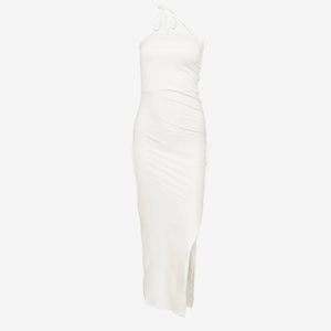 Detail of ruched side texture and side slit on a white bodycon slim dress for women