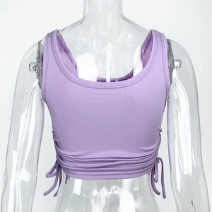 Detail view of the light purple ribbed crop top featuring adjustable side drawstrings