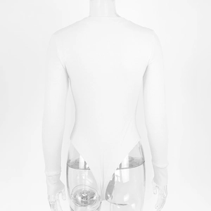 Detail of white ribbed bodysuit showing high-cut leg and tight cotton fabric texture