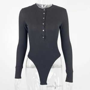 Detail of black ribbed knit bodysuit featuring a Henley neckline with silver metal buttons