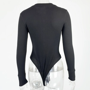 Rear view of a black long-sleeve ribbed bodysuit with a thong cut on a white background