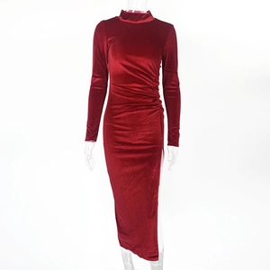 Close-up of elegant pleated waist detail and high slit on a velvet turtleneck dress