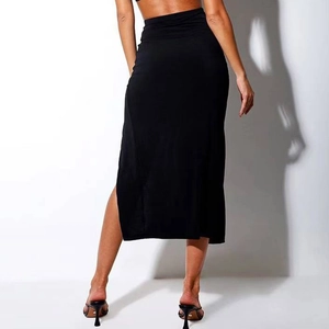 High waist black midi bodycon skirt with side slit detail shown from a back view angle