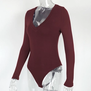 Detail view of burgundy V-neck bodysuit on mannequin showing slim fit and stretch fabric