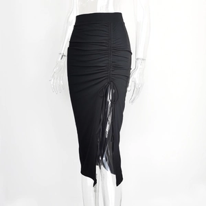 Detail of high waist ruched midi skirt featuring adjustable drawstring and front slit