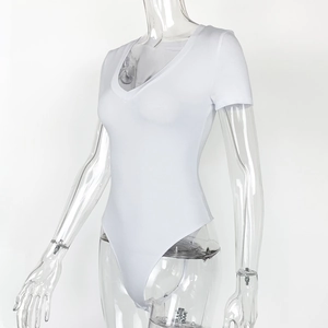 Detail view of white short sleeve V-neck bodysuit with high-cut design and slim fit