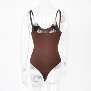 Back view of a deep brown backless bodysuit with thin straps and high-cut leg on mannequin