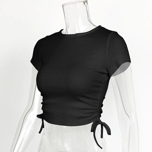 Detail of ribbed knit fabric on women's black crop top with adjustable side drawstrings
