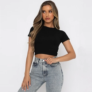 Slim fit black crew neck crop top T-shirt paired with high waisted light blue jeans