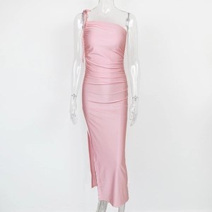 Detail showing pink one-shoulder ruched design and side slit on elegant slim dress