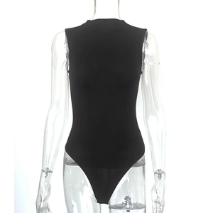 Detail of minimalist black sleeveless bodysuit with high-stretch knit texture and slim fit