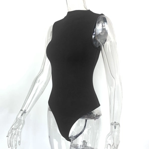 Detail of black ribbed sleeveless bodysuit featuring a mock neck and slim fit design