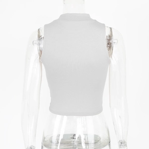 Detailed back view of off-white mock neck crop top featuring ribbed knit texture