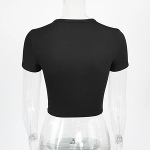 Close-up of the ribbed knit fabric and round neck on the back of this black crop top