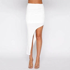 Detail of white ruched bodycon skirt with asymmetrical hem and elastic stretch fabric