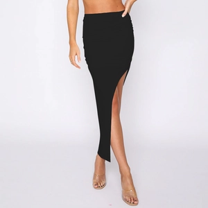 Detail view of high side slit and ruched texture on a black asymmetric slimming skirt