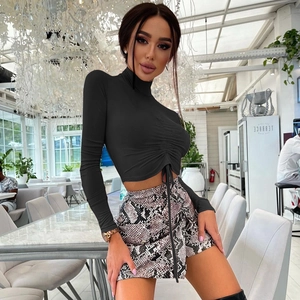 Chic black long sleeve crop top with drawstring ruching and stylish mock neck design