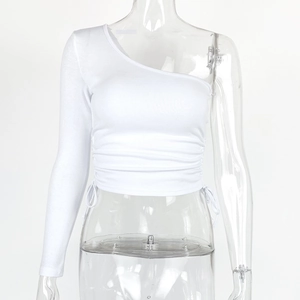 Detail of white one-shoulder long sleeve top with adjustable drawstring ruched side