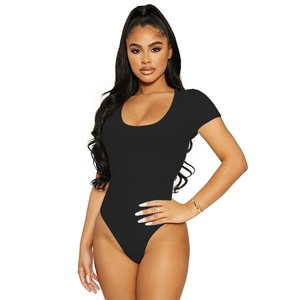 Close-up of a slim-fit black bodysuit featuring a wide U-neckline and high-stretch fabric